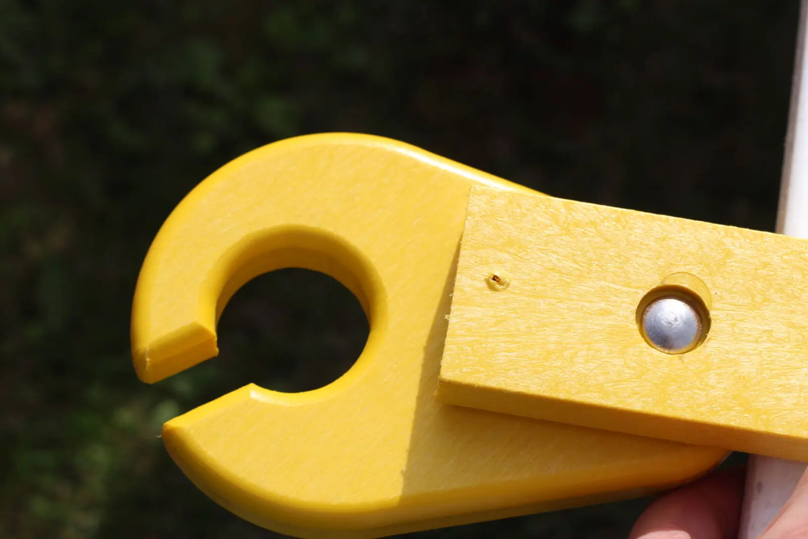 Yellow recycled plastic outdoor furniture arm end cap close-up | Mobek
