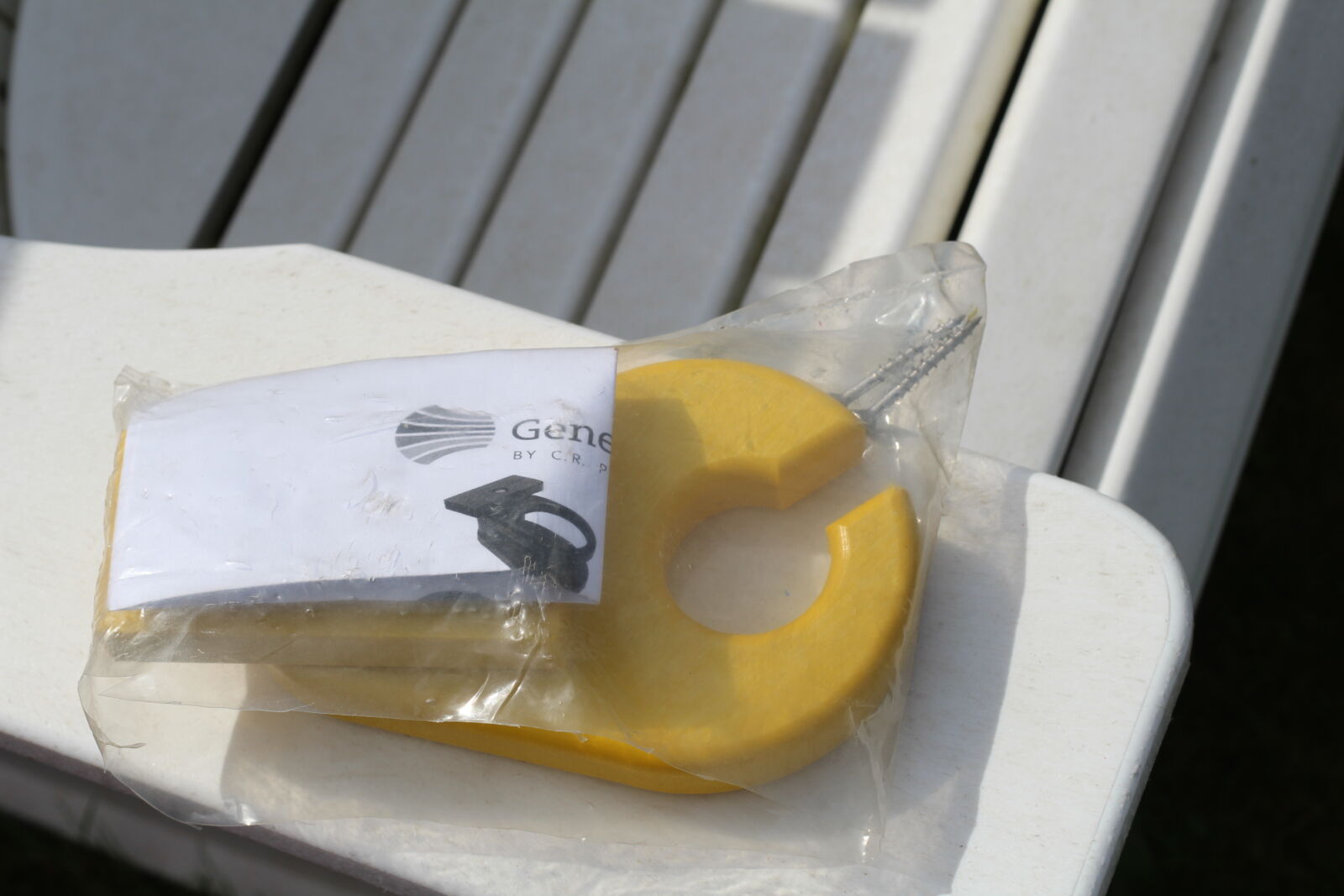 Yellow recycled plastic chair component in packaging | Mobek