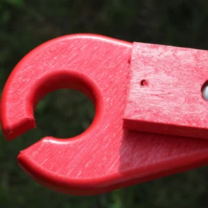 Red recycled plastic outdoor furniture arm end cap close-up | Mobek